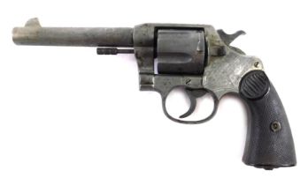 Withdrawn Pre - Sale A Colt pistol, The New Service 455 Eley, 30cm long, in leather case.