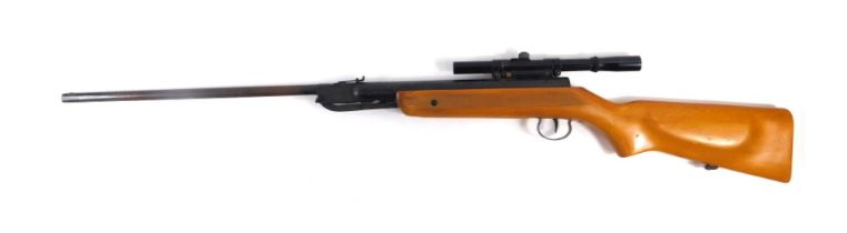 A Hungarian air rifle, .22 calibre, numbered 65142, with telescopic sight and wooden stock, 108cm lo