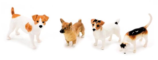 Four Beswick animals, comprising a Beswick dog, Royal Worcester corgi, Beswick terrier, and a huntin