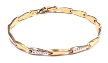 A bicolour bracelet, the diamond shaped lozenges, to include yellow metal, white gold patterned, yel