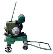 A Ruston Hornsby static engine on wooden base, green painted, number 203642, 92cm high, 71cm wide.