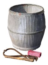 A galvanized dolly tub, with fluted sides, 50cm high.