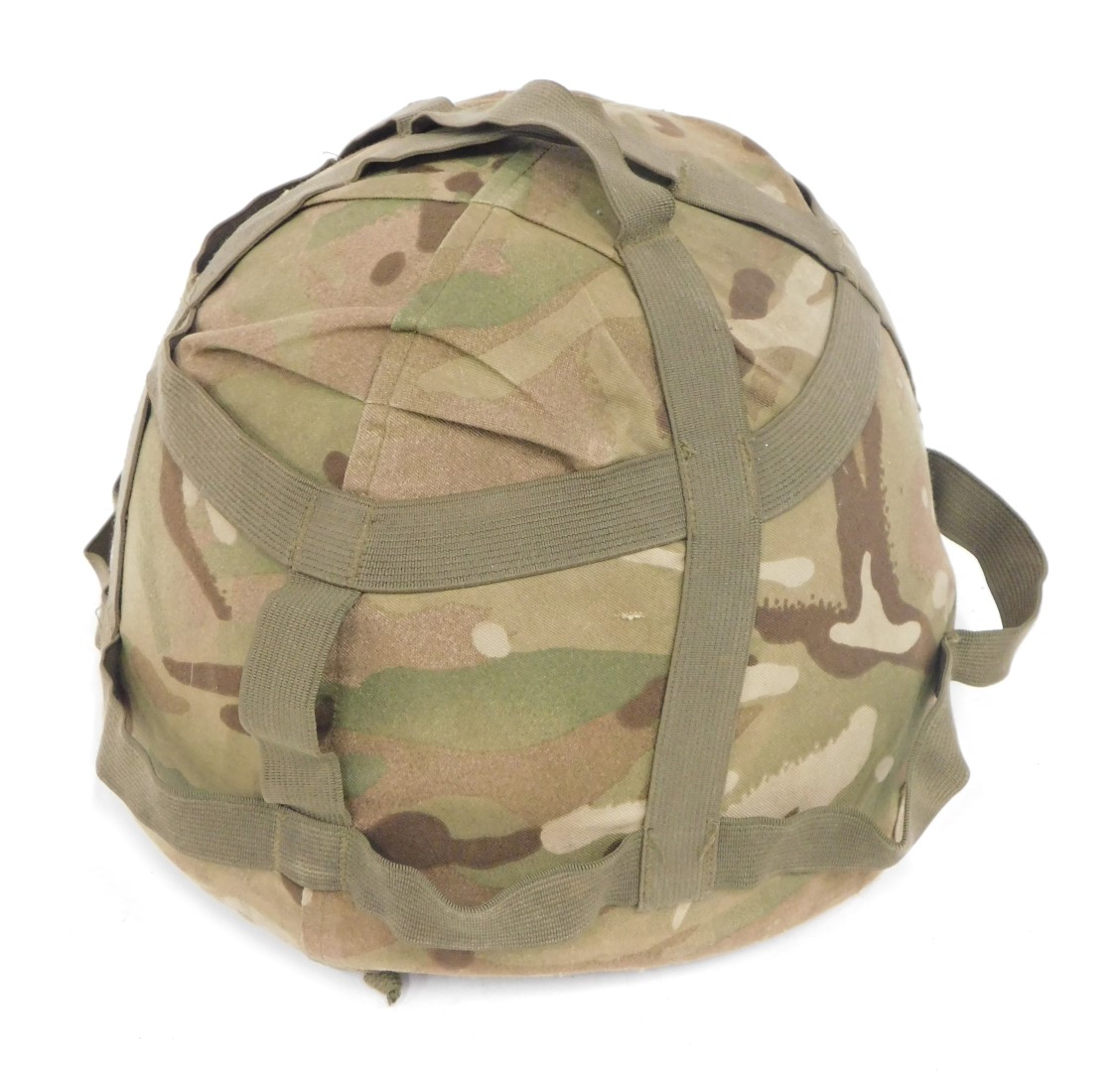 A Mk 6 Army Kevlar camouflaged helmet.