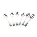 Six silver Victorian and later fiddle pattern serving spoons, comprising a monogrammed near pair bea