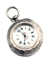 A 19thC Continental fob watch, the heavy hammered floral case with a vacant shield, the white enamel