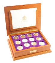 A Queen Elizabeth II Golden Jubilee Royal Mint coin collection, comprising twenty four silver five p