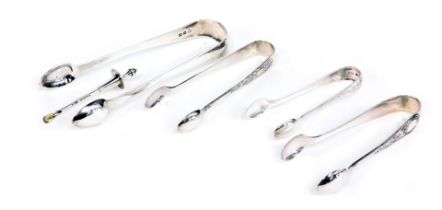 A group of silver and silver plated cutlery, comprising a pair of Victorian silver sugar nips of pla