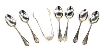 A George V silver spoon and tong set, comprising six teaspoons and set of sugar tongs, each with a t