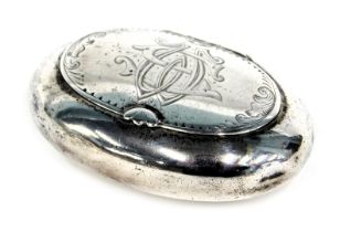A Victorian silver snuff box, oval shaped with hinged lid, with engine engraved decoration bearing t