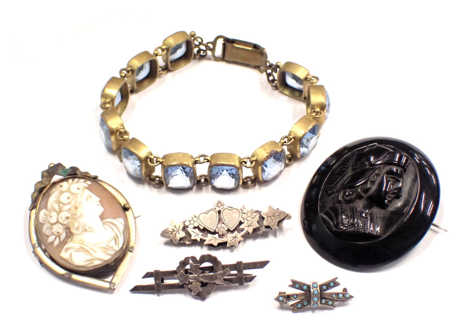 Victorian and later jewellery, comprising a gilt and paste stone set bracelet, a white metal and tur