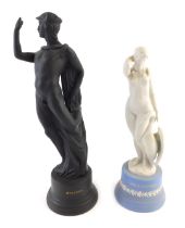 A Wedgwood blue and white Jasperware figure of a Leda and the swan, boxed, 26cm high, and a black ba