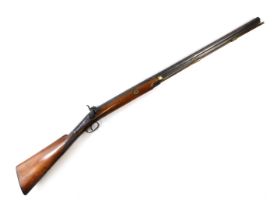 A 19thC percussion sporting gun, with walnut stock and chequered grip Damascus barrel, the lock plat