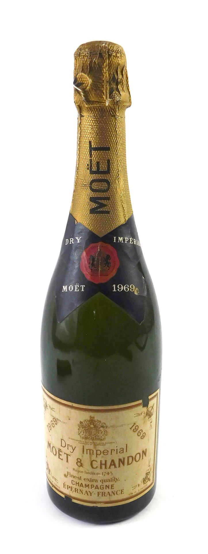 A bottle of Moet & Chandon 1969 Dry Imperial champagne.