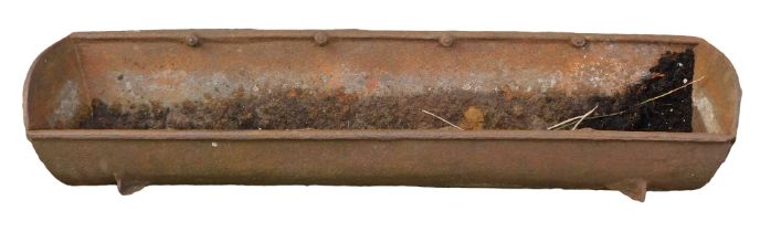 A metal feeding trough, on four bracket feet, 41cm high, 146cm wide, and 39cm deep.