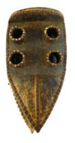 A Grebo (Krou) Maou four eyed warrior mask with articulated Jaw, Liberia, 45cm high.