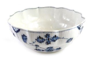 A 19thC Meissen Onion pattern bowl, decorated in blue with ribbed borders, cross swords mark to unde