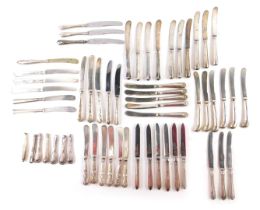 A group of silver handled and stainless steel bladed butter knifes, (1 tray)