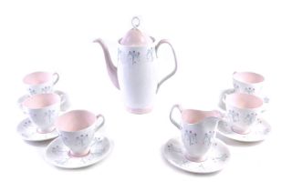 A Royal Albert Magic Moments pattern part coffee service, to include five cups, six saucers, milk ju