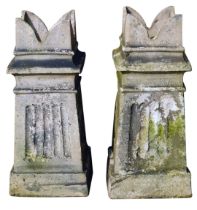 Two reconstituted stone chimney pots, each with a square arched top, on reeded block base, 81cm high