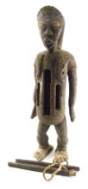 A Dan slit drum standing figure, Cote D'Ivoire, 80cm high.