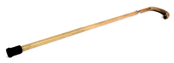 A Victorian Henry Howell sword stick, with an arched elm frame, with a silver collar, hallmarks rubb