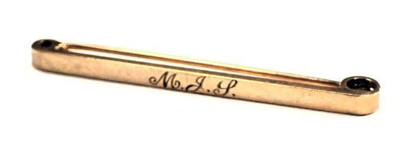 A tie pin, of plain design bearing the initials MJP, yellow metal stamped 9ct, 4cm wide, 2.7g all in
