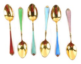 A cased set of six George V silver gilt enamel teaspoons, with red, green, teal, light blue, dark bl