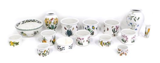 A collection of Portmeirion Botanic Garden jardinieres, two vases, etc.