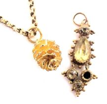 An Edwardian style pendant, set with imitation citrines, in a rub over brass setting, a pine cone pe