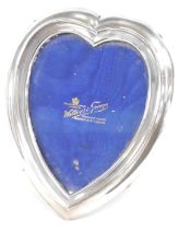 A George V heart shaped silver photograph frame, with rubbed hallmarks, marked Walker & George Diamo