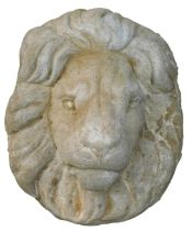 A reconstituted stone lion mask, 36cm high.