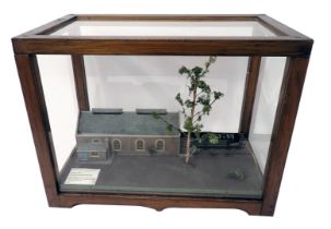 A scale model of an LNER N2 locomotive, with engine shed, etc., in pine and perspex case, 56cm wide.