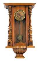 A 19thC walnut cased drop dial wall clock, with barley twist column supports, and a moulded Roman nu