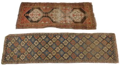 Two early 20thC worn Persian runners, one with a multi coloured geometric design, in blue, red, crea