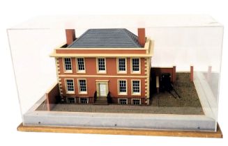 A diorama model of a Georgian house, with landscaping, carriage, etc., in wood and perspex case, 62c