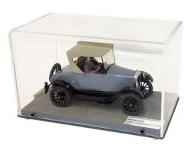 A model of a Model T Ford Runabout, circa 1925, in perspex case, 31cm wide.