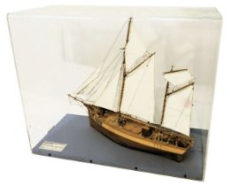 A scale model of the Clara May an English Ketch, circa 1881, in perspex case, 62cm wide.