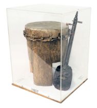 Tribal Art. An African drum with hide lid, and an African stringed instrument, both in same glazed a