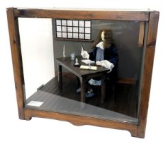 A diorama model of Samuel Pepys, 1633-1703 seated at his desk writing, in wood and perspex case, 61c