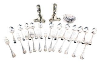 Silver plated fiddle pattern cutlery, bearing the initial J, comprising forks and tablespoons, shell