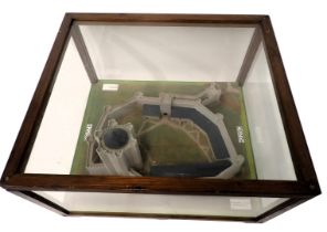 A large diorama model of Conisbrough Castle, Yorkshire, with landscaping, etc., in a perspex and woo