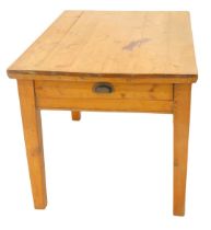 A pine kitchen table, on square tapering legs, the top 120cm x 80cm.