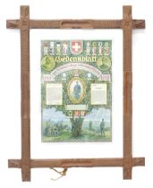 A German WWI certificate relating to Sedenkablat, in carved Black Forest cross frame, 77cm high, 61c