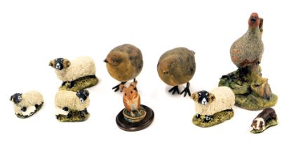 Various animal figure groups, comprising a Country Artist door mouse eating nut, 8cm high, a Border