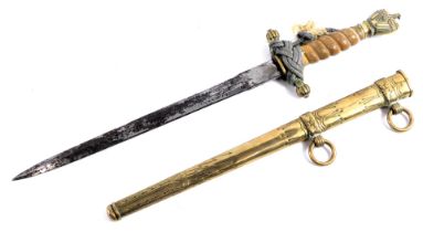 A Solingen dagger, with brass floral case with acorn leaf decoration, and twist handle, with eagle a