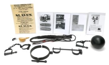 A quantity of display models relating to slavery, to include leather whip, ball and chain, handcuffs