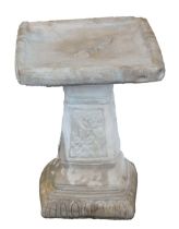 A reconstituted stone Classico birdbath, of square design adorned with roses, 50cm high, 39cm wide.