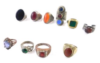 A collection of continental brass, copper and silver coloured rings, possibly Middle Eastern.