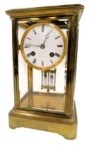 A J. H. Goulding brass cased mantel clock, of rectangular form, with circular enamel Roman numeric b