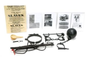 A quantity of display models relating to slavery, to include leather whip, ball and chain, handcuffs